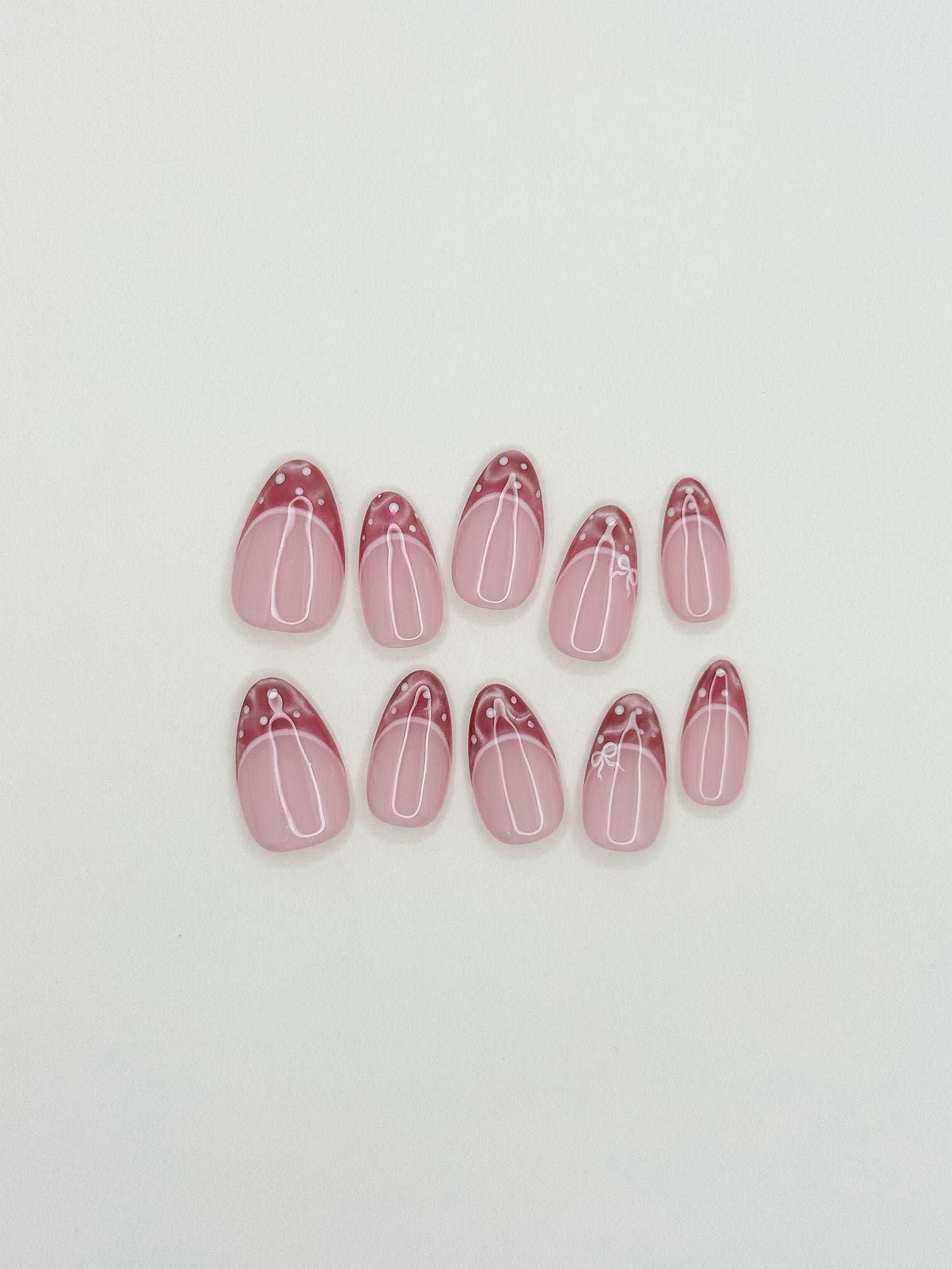 Doe Eyes short almond pink cat-eye French tip press-on nail set with white fawn spots