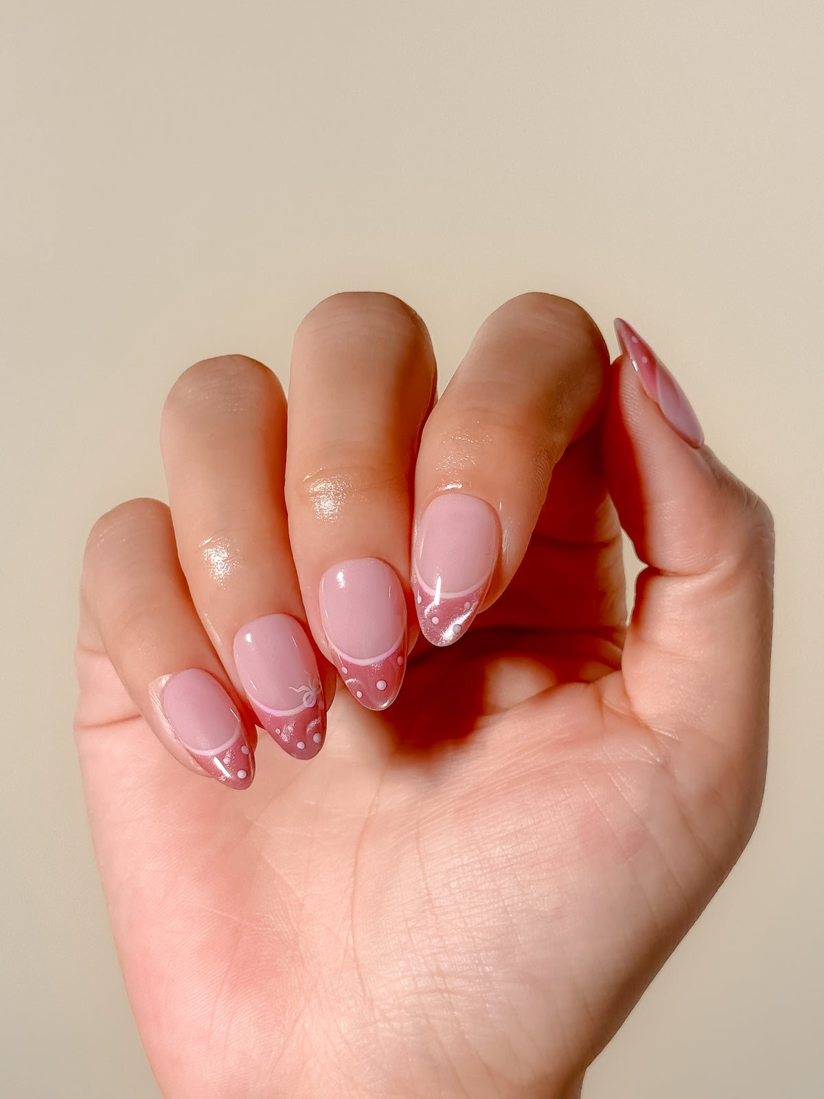 Doe Eyes short almond pink cat-eye French tip press-on nail set with white fawn spots