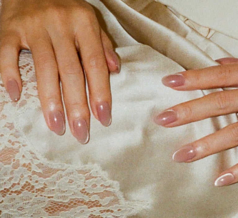 Pinkish nude press on nails in cateye effect